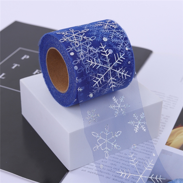 Yarda de Tul Azul con copos Plateados 8cm