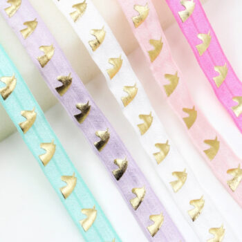 Yarda de Bies Elástico Lila con Holograma Dorado Unicornio